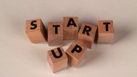 wooden blocks spelling start up concept