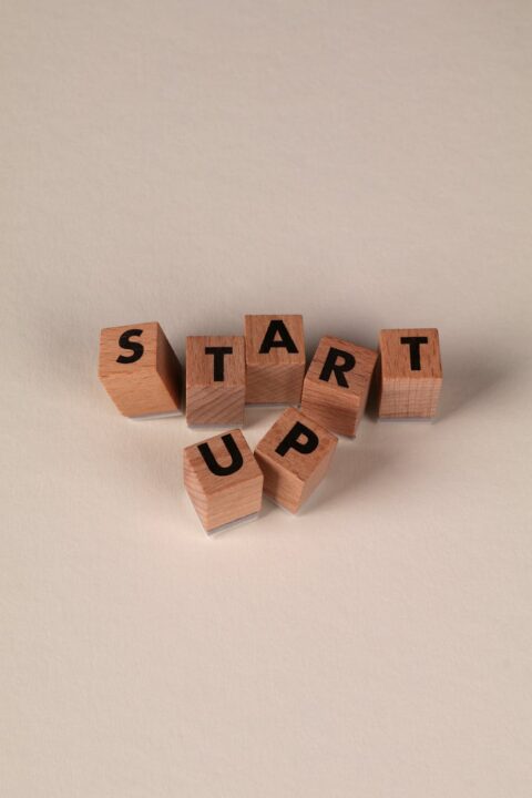 wooden blocks spelling start up concept