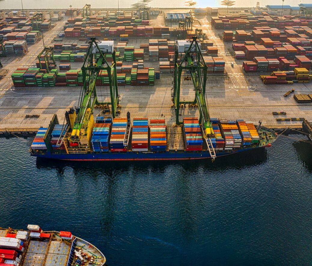 drone shot of a cargo ship on port