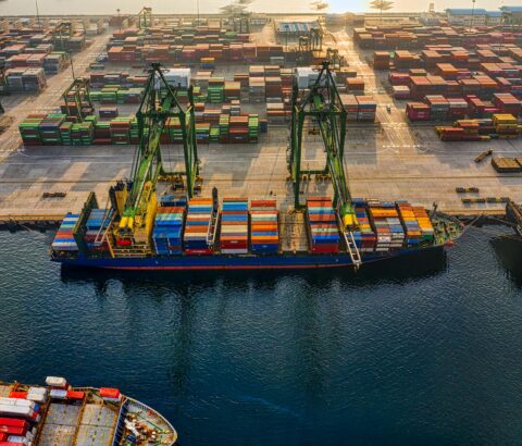drone shot of a cargo ship on port